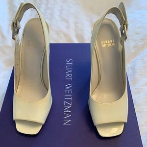 Stuart Weitzman cream sling backs.